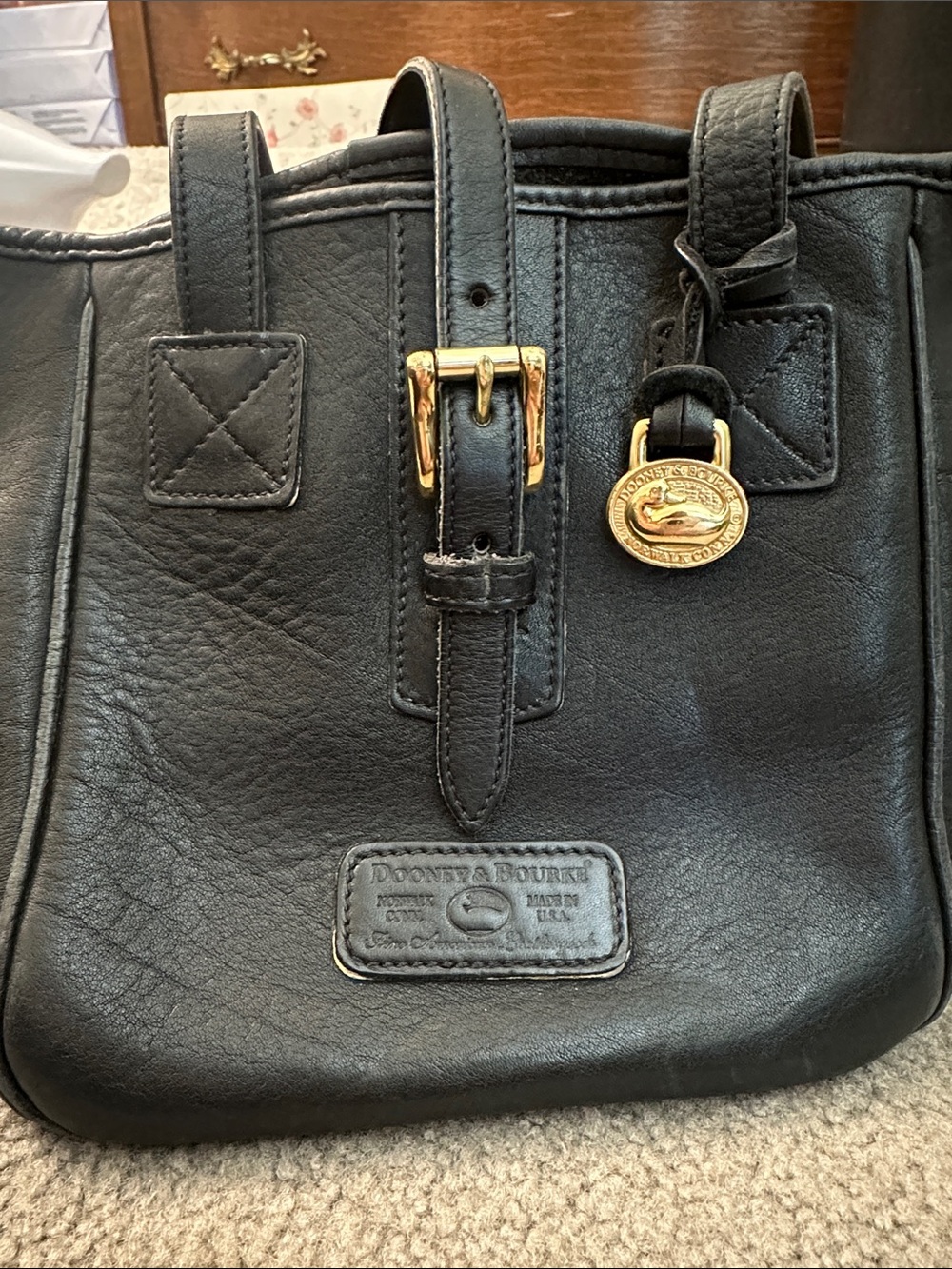 Dooney & Bourke, Vintage Black Leather Tote Bag with Gold Hardware